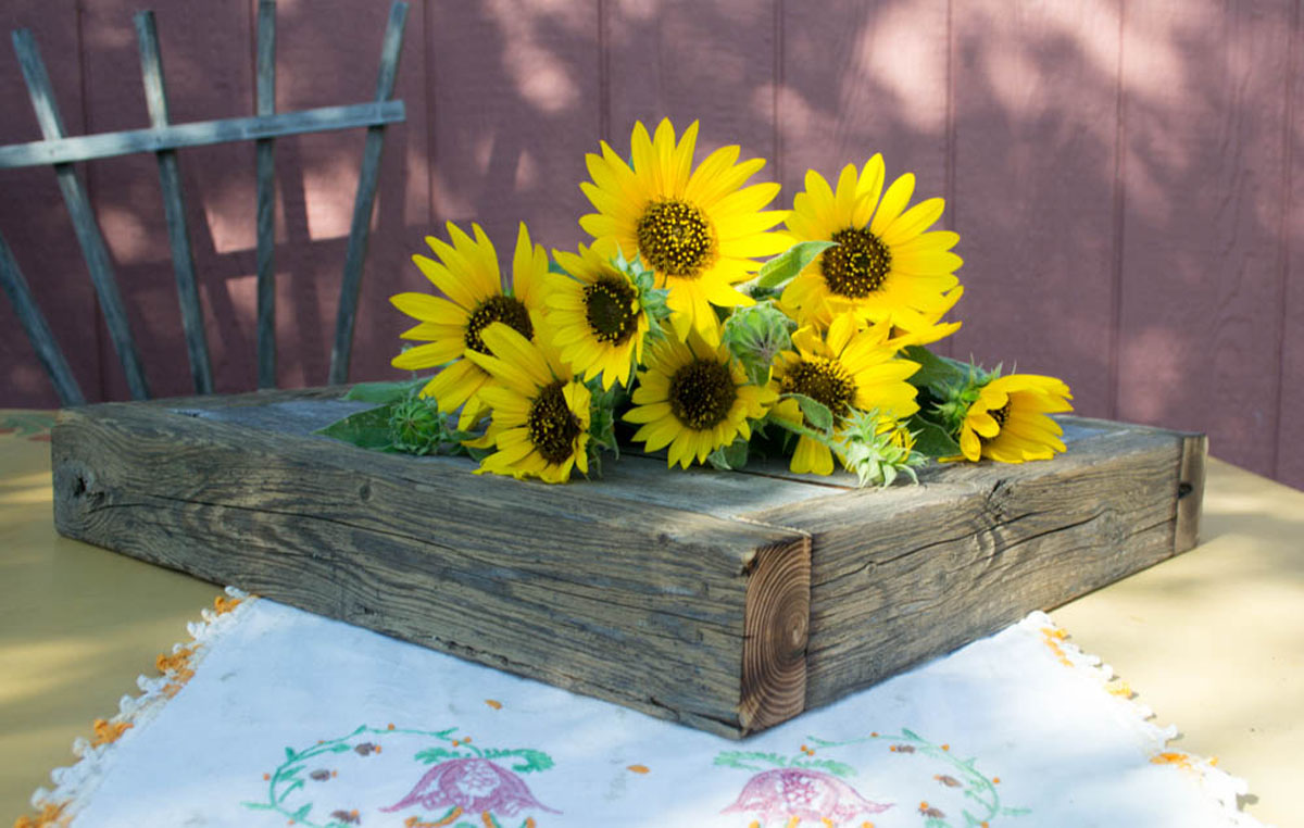 rustic cake stand with sunflowers