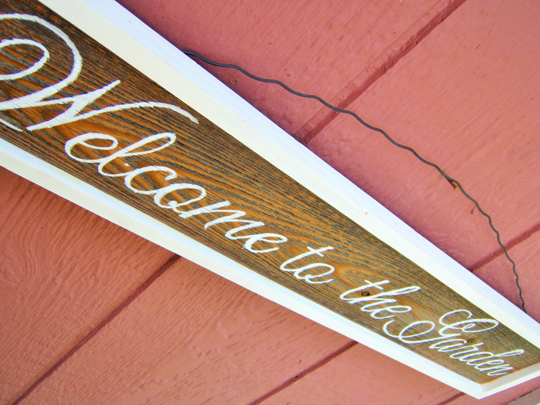 welcome to the garden wood white frame left